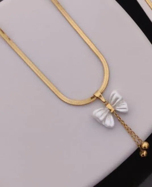 Mother of pearl butterfly pendant on gold herringbone chain by PinkbyPC
