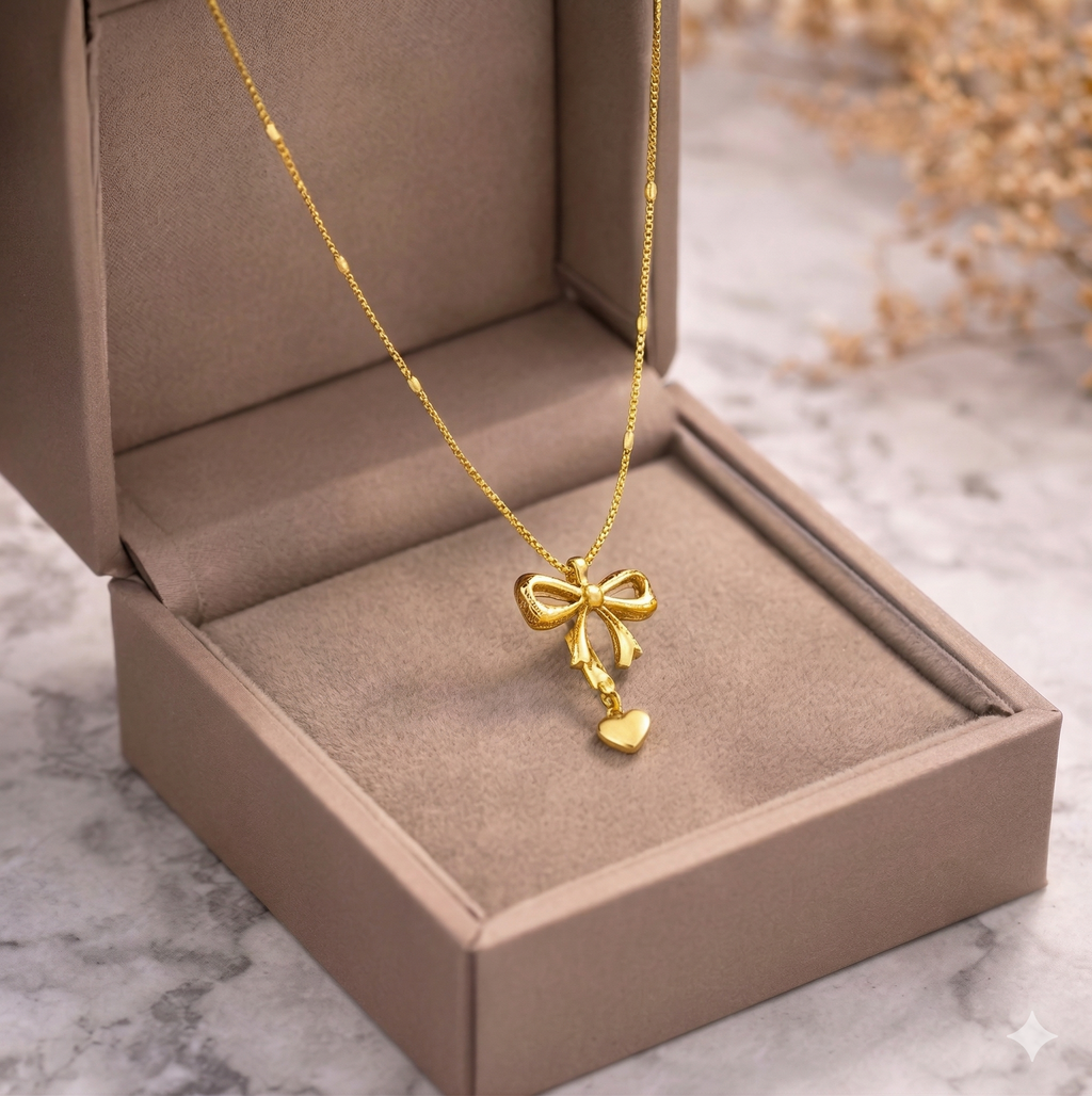 Bow Drop Layer necklace - bow with hanging heart detail by PinkbyPC