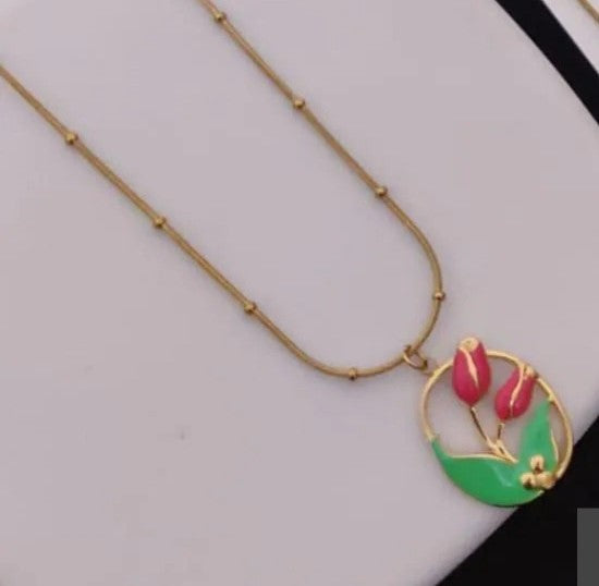 Gold beaded chain with vibrant pink enamel tulip pendant by PinkbyPC