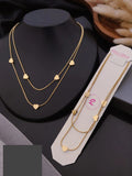 Layered gold necklace with multiple heart charms by PinkbyPC