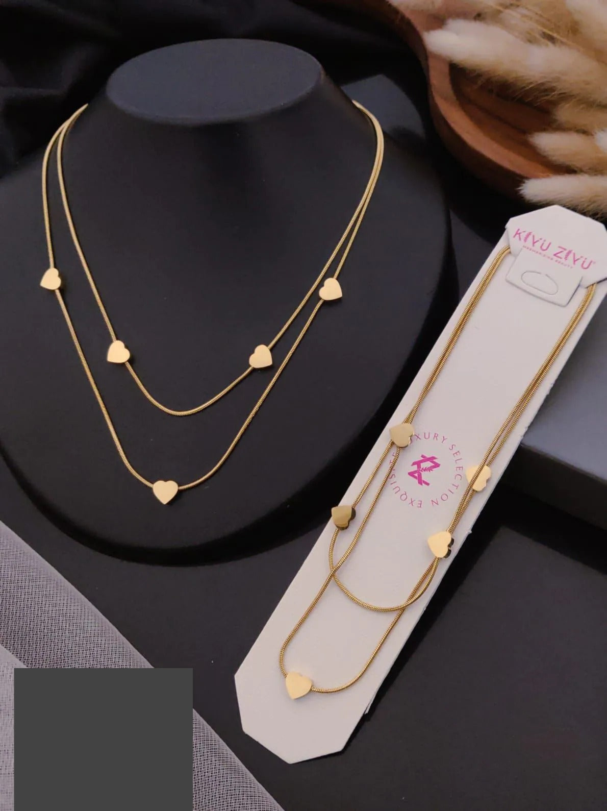Layered gold necklace with multiple heart charms by PinkbyPC