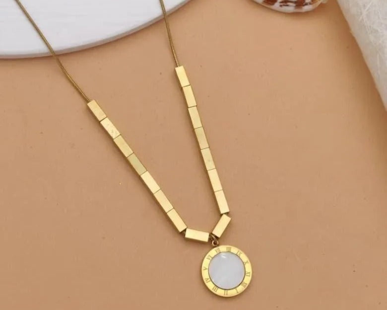 Gold bar chain necklace with roman numeral medallion by PinkbyPC